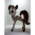Playful Porcelain Pony Figurine