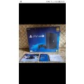 Playstation 4 Pro4, 2x controllers and disc games
