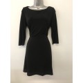 Suits 12 / 36 designer is MANGO  stunning black dress with cut out A-Line.