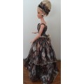 Shiny black patch flounced dress on 47cm doll