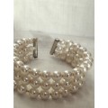 Costume Bracelet - 4 bands of lookalike Pearls