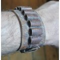 Unusual old leather 10-shot ammo cartridge wristband - probably for a .22