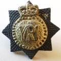 Royal Canadian Regiment bi-metal cap badge plus small pin badge