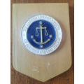 Maritime Law Association of Australia and New Zealand badge on wooden plaque