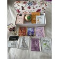 Collection of pamper spoils including small Gucci Flora perfume