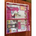Barbie carry case and clothes as shown