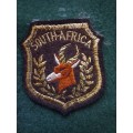SPRINBOK BADGE 1950s-INTERNATIONAL SCROLL- WITH 29X EMBROIDERED BADGES