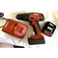 Hilti SF 2H-A Cordless Hammer Drill/Driver with charger and 2 batteries.