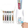 Toothpaste dispenser and toothbrush holder