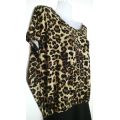 Leopard Print Mini dress with dramatic scooped Back Size 10