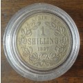 Encapsulated 1897 ZAR Kruger silver shilling in vf+