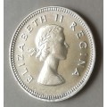 Nice 1954 union proof silver tickey