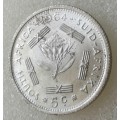 Encapsulated 1964 Republic silver 5c in AU