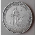 The rare 1930 union silver shilling in VF