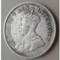 The rare 1930 union silver shilling in VF