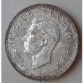 Toned 1952 union proof silver 2 Shillings