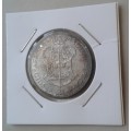 Toned 1952 union proof silver 2 Shillings