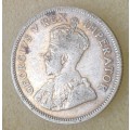 Scarcer 1928 union silver shilling.