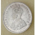 1929 union silver shilling.
