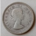 1954 Union silver shilling.