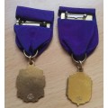 Pair of small 10ct gold-filled Lions Club awards