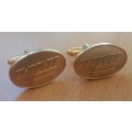 Pair of vintage gold-coloured cufflinks, MMI logo