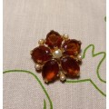 Pretty vintage costume brooch with light brown and pearl-like detail