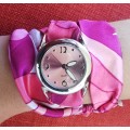 Pair of cloth strap watches - new batteries, working