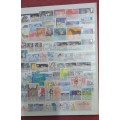 A4 STOCKBOOK USED 16/32 PAGES FISRT PAGE DAMAGED MOSTLY GB HIGH VALUE IN STAMPS