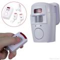 Wireless Motion Sensor Alarm and Chime Kit with two remote controls and wall mount