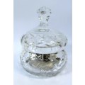 crystal lidded container in perfect damage free condition, assorted items of interest inside
