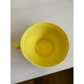 Large, bright yellow `The Conran Shop` bowl/cup