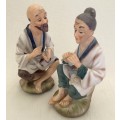 #47 TWO MATT-GLAZE FIGURES, 14cm high - price is for the pair