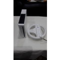 NINTENDO WII WITH REMOTE AND FOUR GAME DISC(NO CABLES)