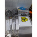 NINTENDO WII INCLUDING POWER SUPPLY,2 REMOTES,6 GAME DISCS AND ASSESCORIES