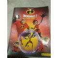 BOX OF 36 PACKETS INCREDIBLES 2 STICKERS(5-6 STICKERS IN A PACK) AND A STICKER ALBUM