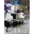 MINI ELECTRIC SEWING MACHINE WITH DOUBLE THREAD AND 2 SPEED CONTROL