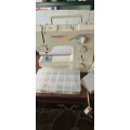 BERNINA 1005*MADE IN SWITZERLAND (ALL METAL SEWING MACHINE WITH ATTACHMENTS AND CARRY CASE-WORKS WEL