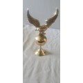 VINTAGE BRASS EAGLE LANDING ON BALL STAND