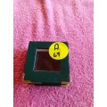 Green Coin Holder Box. Box with plastic top.