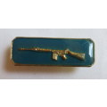 SAAF INSTRUCTOR QUALIFICATION BREAST BADGE-GOLD RIFLE IN BLUE- 2 PINS