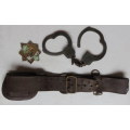 OLD SAP LEATHER BELT WITH POACH & HANDCUFFS (NO KEYS) SOLD TOGETHER WITH HELMET PLATE-MEASURES 92X84