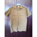 SADF NUTRIA SHIRT,LABELLED AND DATED 1990 SMALL-MEASURES 50 CM ARMPIT TO ARMPIT-VERY GOOD CONDITION