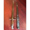 JAPAN EARLY PRODUCTION 30TH YEAR (1897) BAYONET/SWORD-IT HAS A ROUNDED POMMEL,SHAPED GRIPS AND A HOO