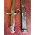 JAPAN EARLY PRODUCTION 30TH YEAR (1897) BAYONET/SWORD-IT HAS A ROUNDED POMMEL,SHAPED GRIPS AND A HOO