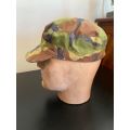 ORIGINAL RECCE COPY TANZANIAN CAMOUFLAGE CAP WITH ORIGINAL PAPER LABEL FOR CROSS REFERENCE CODES-INS