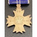 MINIATURE SOUTHERN CROSS DECORATION (SD)1975(MERITORIOUS SERVICE)SILVER,SA MINT MARKINGS AND NUMBERE