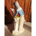 Lady with Bird Glazed Porcelain Figurine