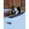 Vintage Partially Glazed Clay Oriental Fisherman in Boat