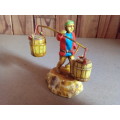 Small Basket Carrying Oriental Figurine
